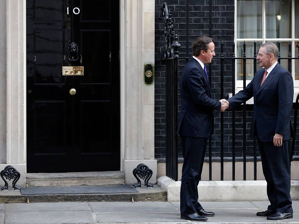 David Cameron greets Jacques Rogge outside Number 10